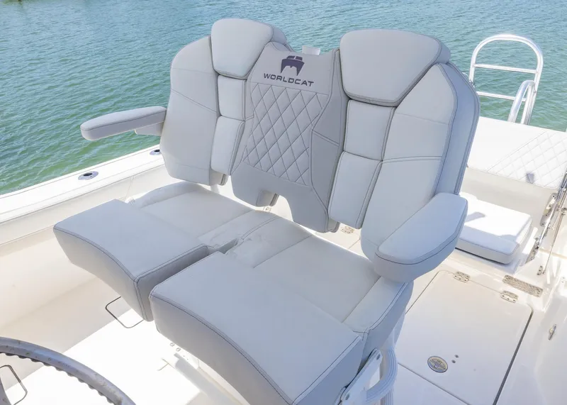 Slide: The Image of 2024 World Cat 260CC boat seating with luxurious gray upholstery and diamond stitching. - 14