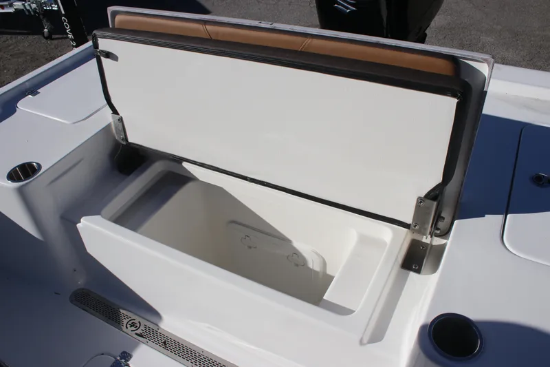 Slide: The Image of Open storage compartment on 2025 Sea Pro 250 Bay boat, showcasing interior space. - 5