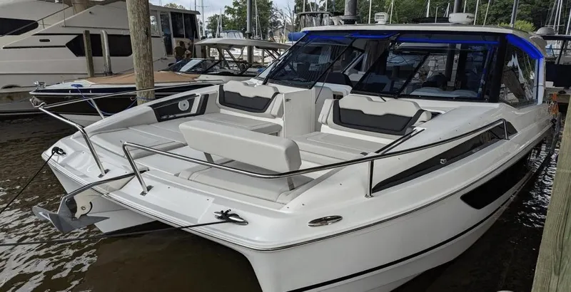 Slide: The Image of Aquila 36 Sport 2020 boat docked, featuring sleek design and comfortable seating. - 0