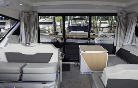 Slide: The Image of Interior of 2020 Aquila 36 Sport yacht with modern seating and table. - 6