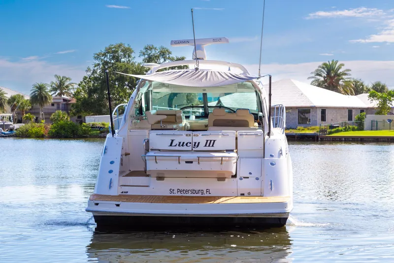 Slide: The Image of Sea Ray 410 Sundancer 2013 yacht on water, rear view, sunny day, St. Petersburg, FL. - 3