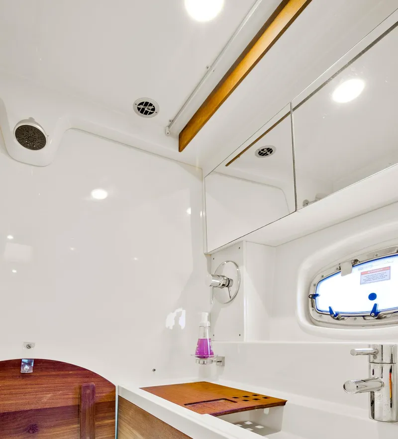 Slide: The Image of Luxurious bathroom interior of 2013 Sea Ray 410 Sundancer yacht with modern fixtures. - 45