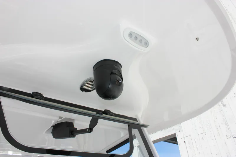 Slide: The Image of 2025 Sea Hunt Ultra 275 SE boat with mounted camera and speaker on the ceiling. - 22