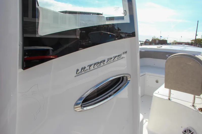 Slide: The Image of 2025 Sea Hunt Ultra 275 SE boat interior, showcasing sleek design and modern features. - 37
