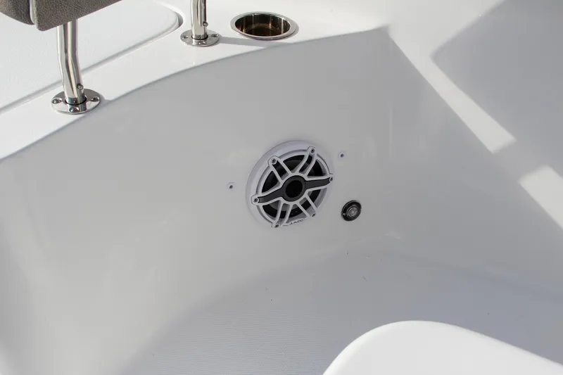 Slide: The Image of 2025 Sea Hunt Ultra 275 SE boat interior with speaker and cup holder. - 46