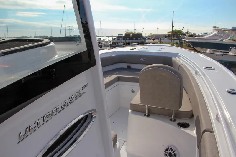 Slide: The Image of 2025 Sea Hunt Ultra 275 SE boat interior with seating and sleek design. - 47