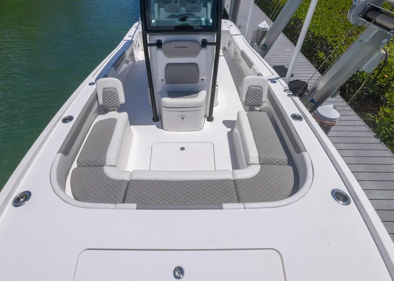 Slide: The Image of 2023 Caymas 28 HB boat with spacious seating and sleek design. - 13