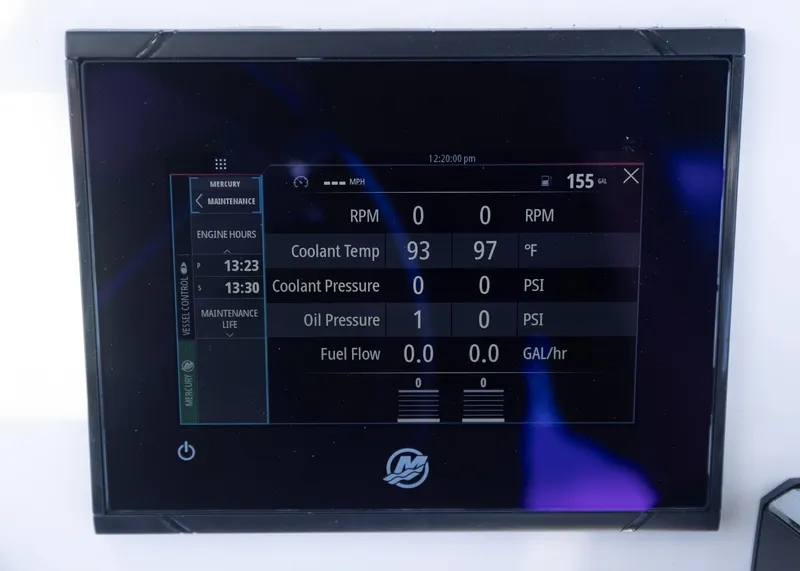 Slide: The Image of Digital display panel on 2023 Caymas 28 HB showing engine metrics and maintenance information. - 19