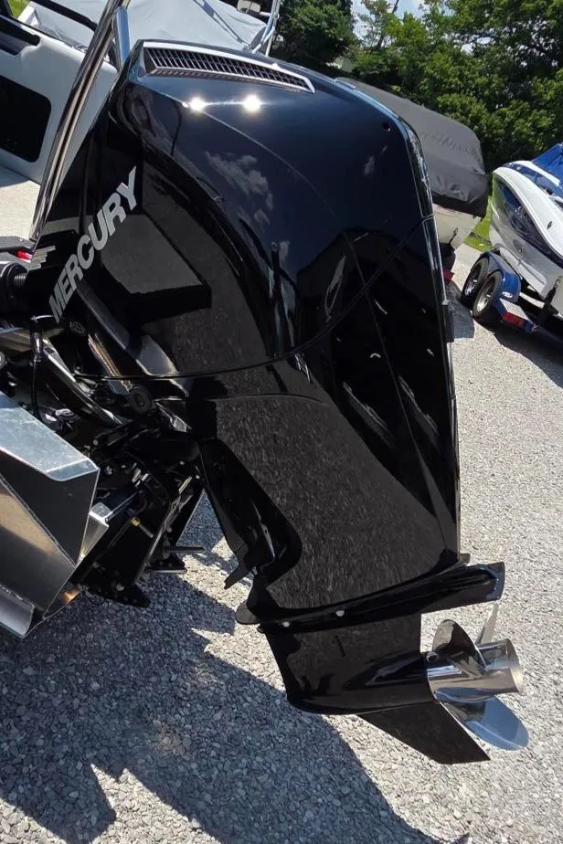 Slide: The Image of 2025 Avalon Platinum LSZ 2585 with Mercury outboard engine, versatile rear bench design. - 10