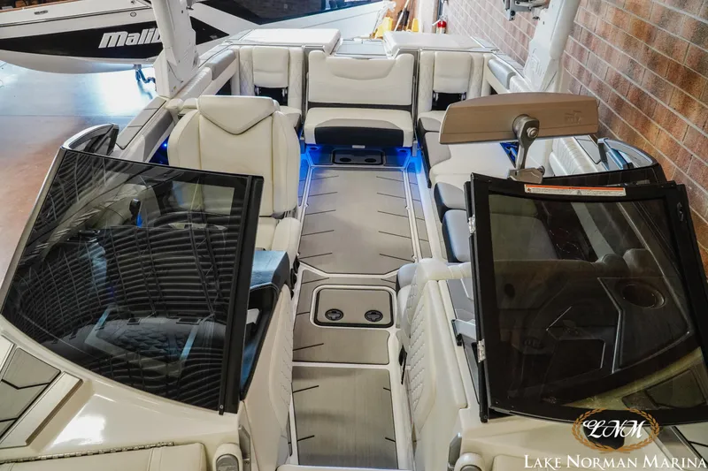 Slide: The Image of 2021 Malibu M240 boat interior with sleek seating and modern design at Lake Norman Marina. - 16