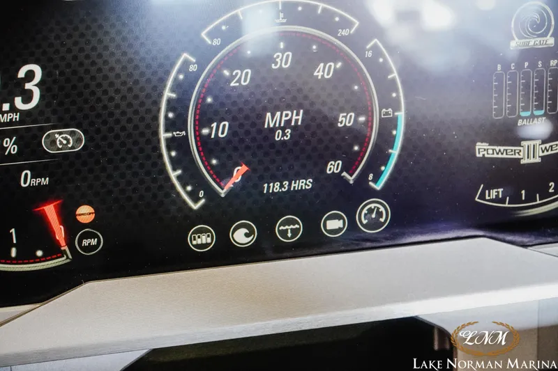 Slide: The Image of Dashboard of a 2021 Malibu M240 boat showing speedometer and various gauges. - 22