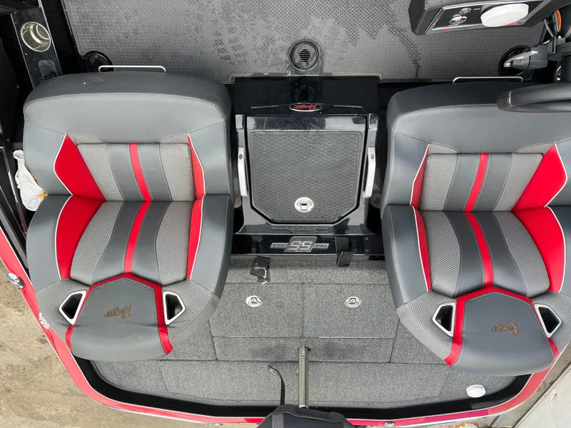 Slide: The Image of 2023 Ranger Z521R boat seats with red and gray design, top view. - 13
