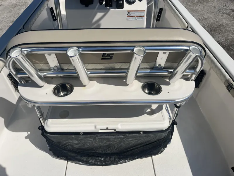 Slide: The Image of 2021 Carolina Skiff 25 LS boat console with rod holders and storage net. - 10