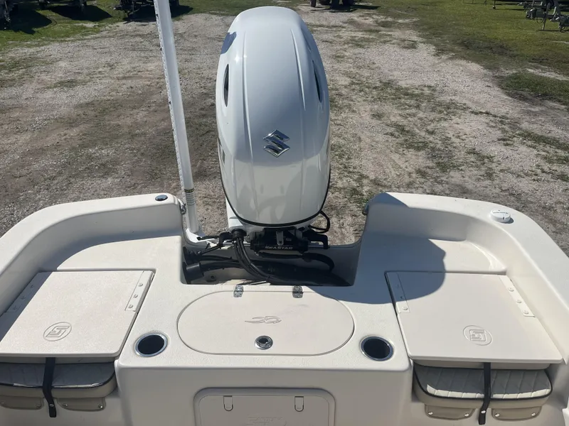 Slide: The Image of 2021 Carolina Skiff 25 LS boat with Suzuki outboard motor, rear deck view. - 11