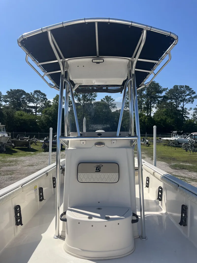 Slide: The Image of 2021 Carolina Skiff 25 LS boat with T-top, viewed from the bow. - 13