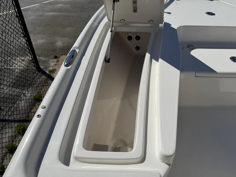Slide: The Image of Open storage compartment on 2020 Key West 210 BR boat deck. - 14