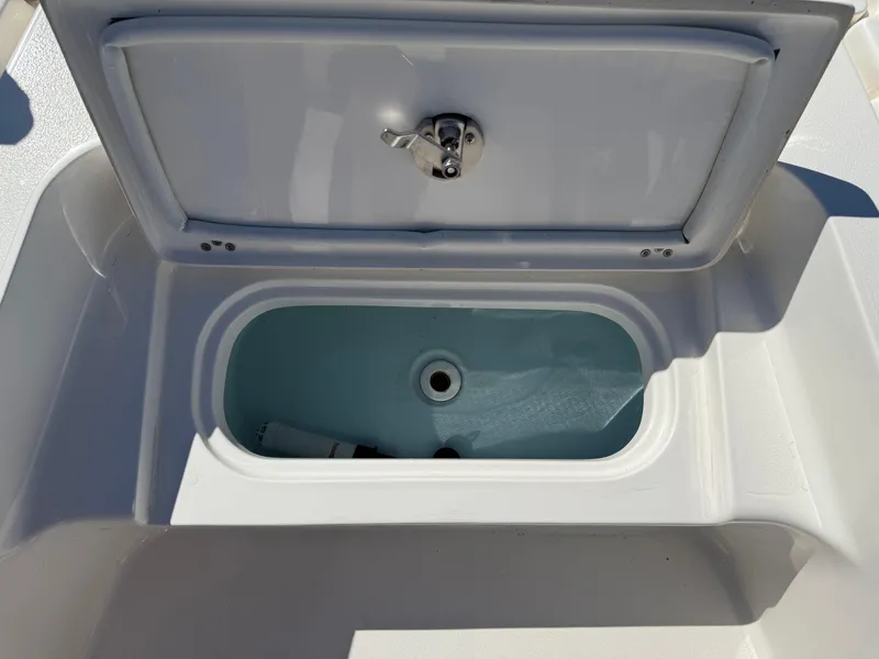 Slide: The Image of Open storage compartment on 2020 Key West 210 BR boat. - 15