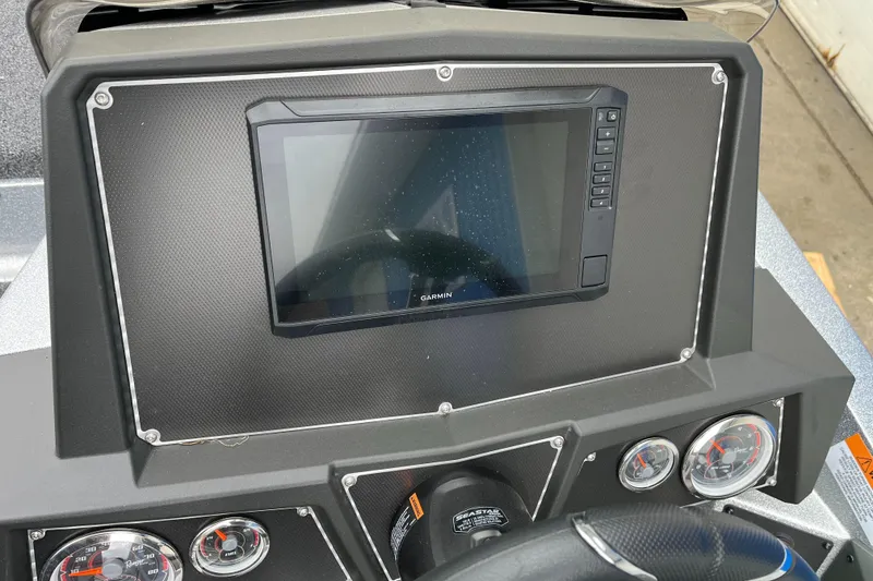 Slide: The Image of 2024 Ranger Z518 Garmin dashboard with digital display and gauges. - 12