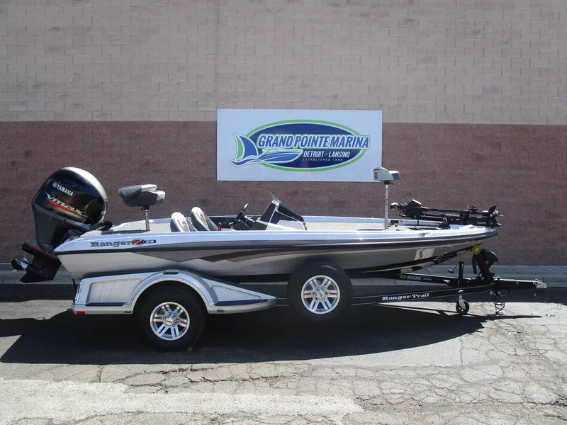 Slide: The Image of 2024 Ranger Z518 Garmin Ranger Cup boat on trailer at Grand Pointe Marina. - 3