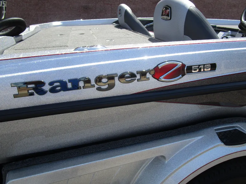 Slide: The Image of 2024 Ranger Z518 Garmin Ranger Cup Equipped boat, silver finish, close-up view. - 5