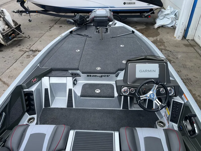 Slide: The Image of 2024 Ranger Z518 Garmin Ranger Cup boat interior with advanced navigation system. - 8