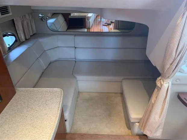 Slide: The Image of 2006 Regal Commodore 3760 IO interior with plush seating and elegant design. - 22