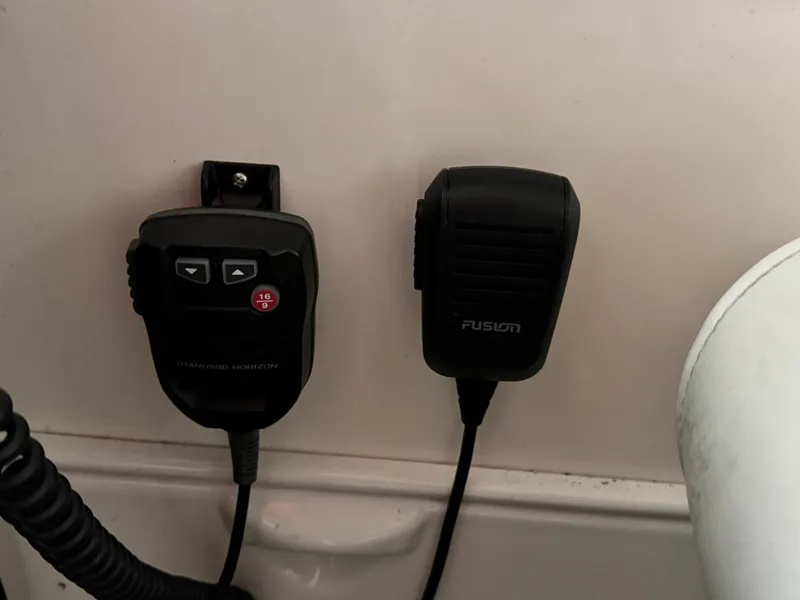 Slide: The Image of Two black communication devices mounted on a 2006 Regal Commodore 3760 IO boat. - 33