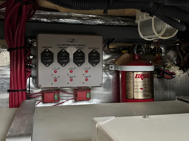Slide: The Image of Electrical panel and fire extinguisher in 2006 Regal Commodore 3760 IO boat. - 37