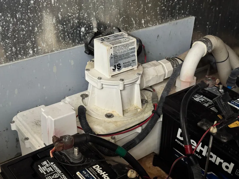 Slide: The Image of Bilge pump and batteries in 2006 Regal Commodore 3760 IO boat engine compartment. - 39