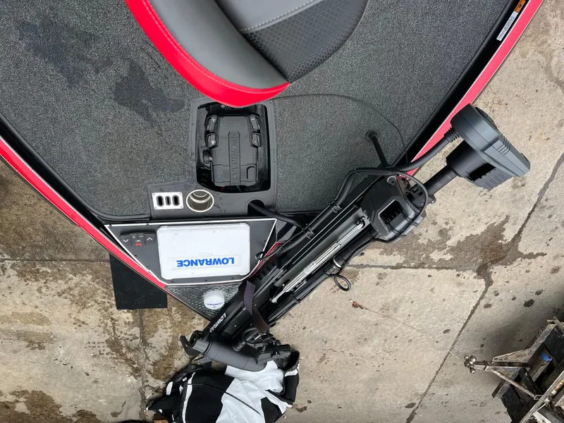 Slide: The Image of 2024 Ranger Z521 RC boat deck with Lowrance equipment and trolling motor. - 12