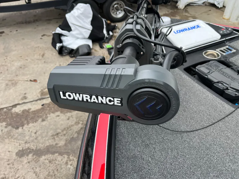 Slide: The Image of Lowrance equipment on 2024 Ranger Z521 RC boat, featuring advanced navigation technology. - 13