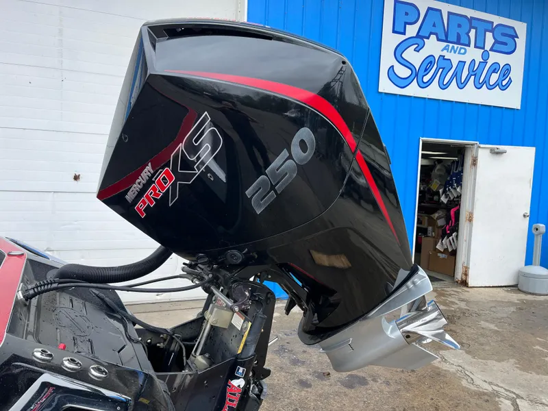 Slide: The Image of 2024 Ranger Z521 RC boat with Mercury Pro XS 250 engine at service center. - 16