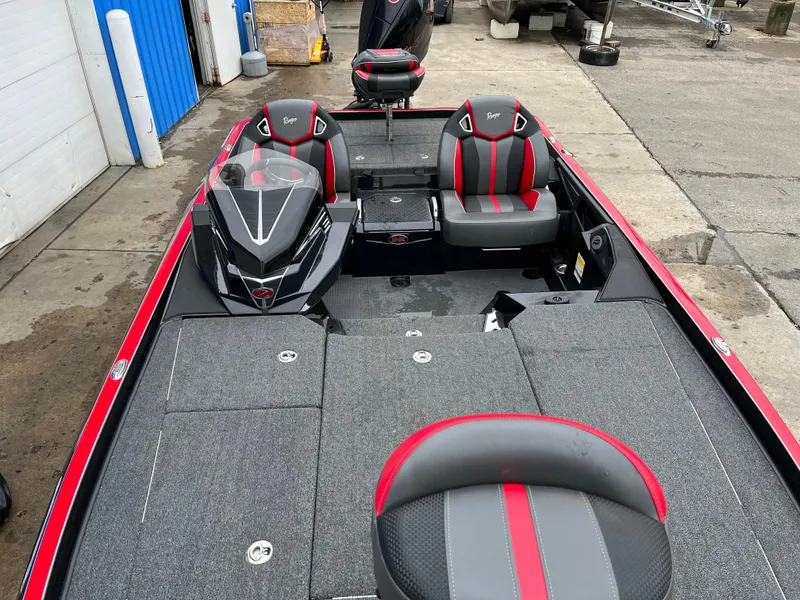 Slide: The Image of 2024 Ranger Z521 RC boat with red and gray seating, spacious deck, and modern design. - 5