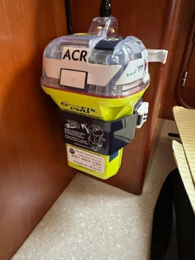 Slide: The Image of ACR GlobalFix PRO emergency beacon mounted on Passport 545 Vista, 2014 model. - 39