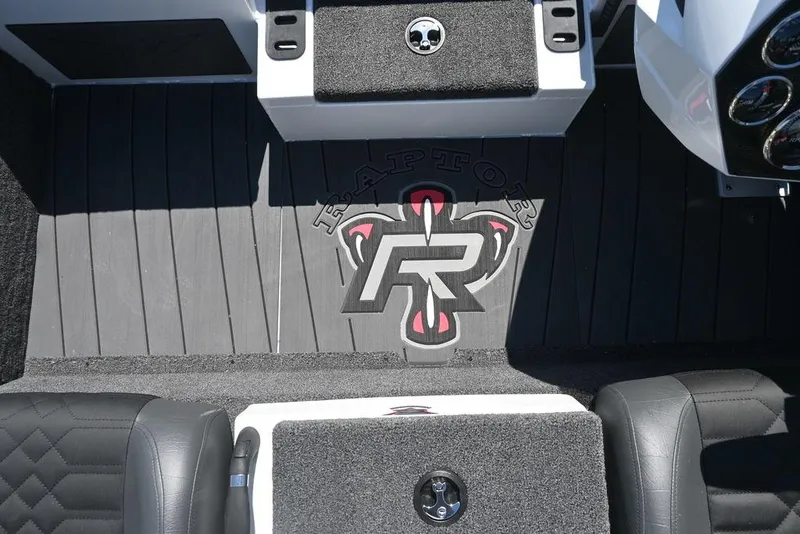 Slide: The Image of 2025 Vexus AVX 1980 boat interior with Raptor logo on deck. - 10