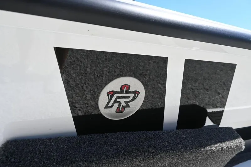 Slide: The Image of 2025 Vexus AVX 1980 boat detail with logo and textured surface. - 4