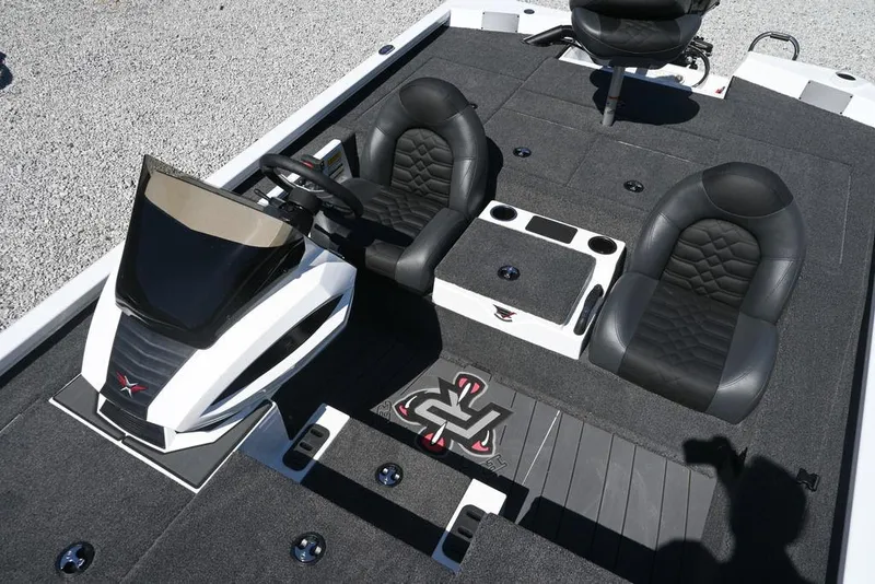 Slide: The Image of 2025 Vexus AVX 1980 boat interior with sleek black seats and modern dashboard design. - 9