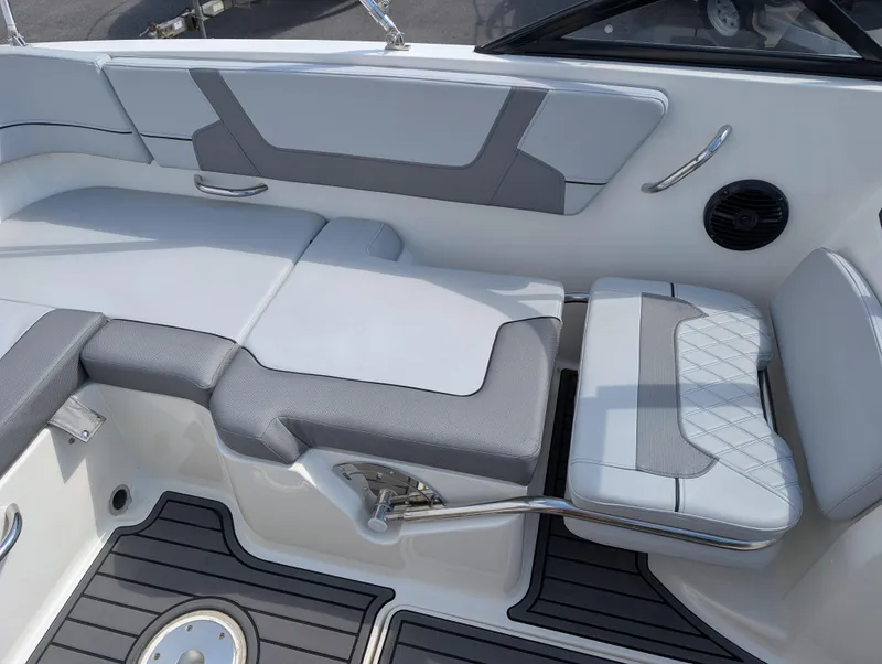 Slide: The Image of 2023 Bayliner VR5 Bowrider I/O interior with gray seating and modern design. - 15