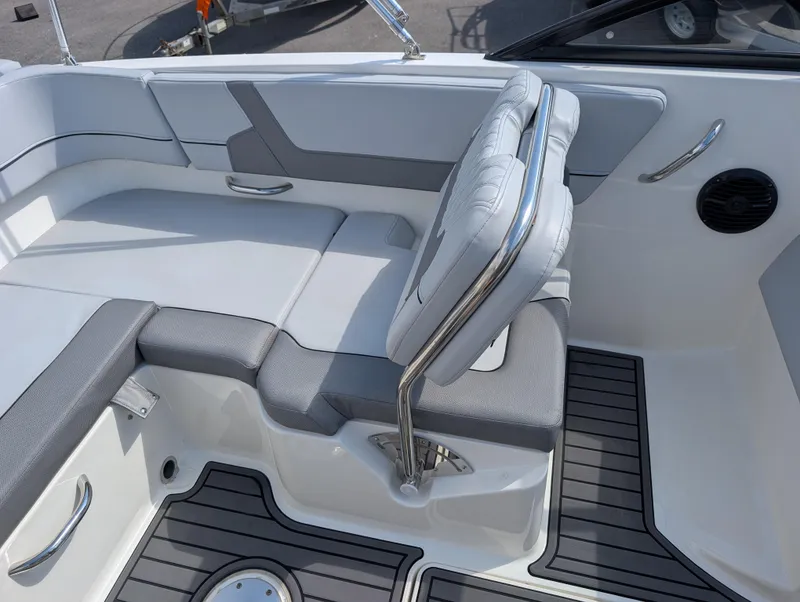 Slide: The Image of 2023 Bayliner VR5 Bowrider I/O interior with gray seating and sleek design. - 16