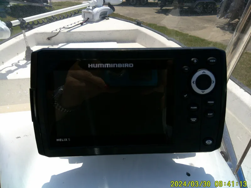 Slide: The Image of Humminbird Helix 5 fish finder on 2016 Key Largo 160 CC boat dashboard. - 17