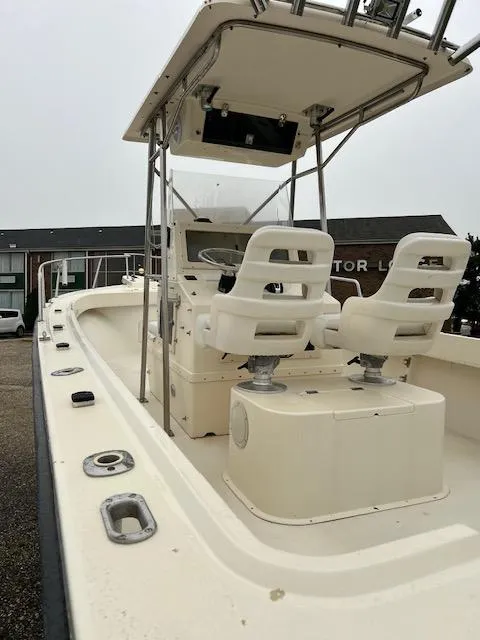 Slide: The Image of 1996 Parker 2300 DV Center Console boat with dual seats and T-top. - 6