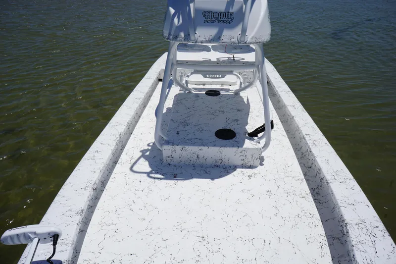 Slide: The Image of 2019 Haynie 23 Super Cat boat deck on calm water. - 8