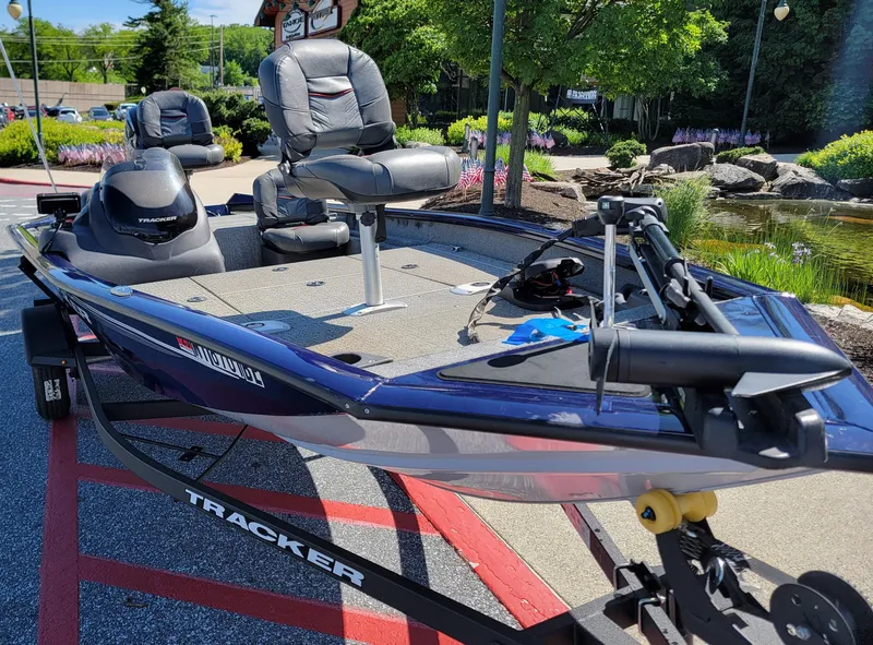 Slide: The Image of 2021 Tracker Pro Team 175 TF fishing boat on display, featuring comfortable seating and modern design. - 5