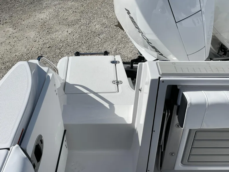 Slide: The Image of 2025 Blackfin 252CC boat deck with engine, featuring sleek design and modern amenities. - 31