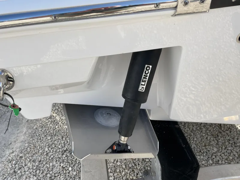 Slide: The Image of 2025 Blackfin 252CC boat with Lenco trim tab actuator detail. - 34