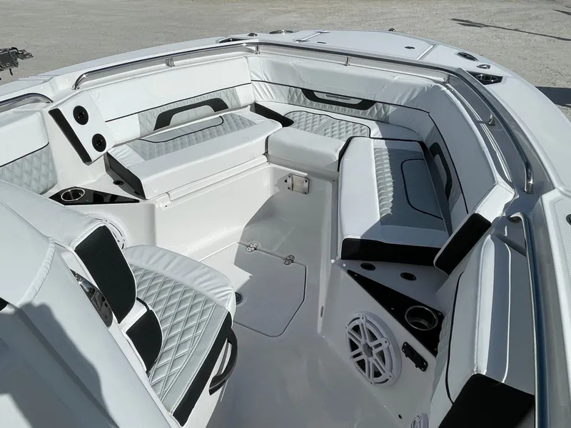Slide: The Image of 2025 Blackfin 252CC boat interior with luxurious seating and modern design. - 9