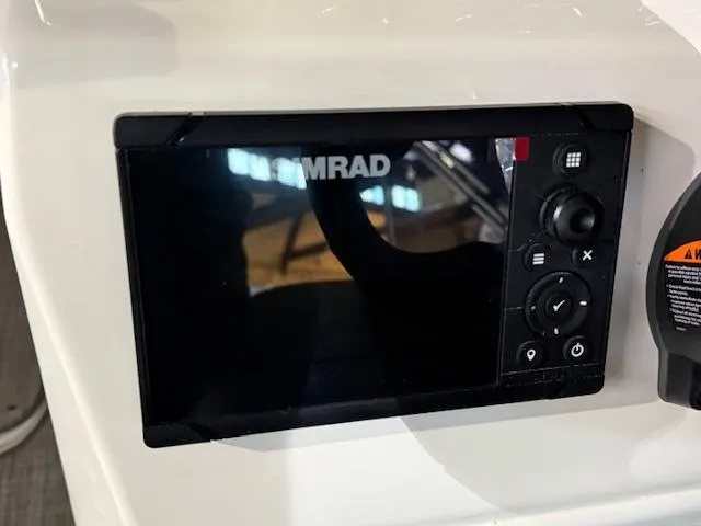 Slide: The Image of Simrad display on 2023 NauticStar 203 DC boat dashboard. - 7