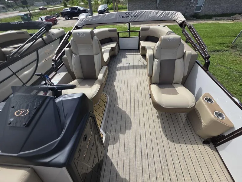 Slide: The Image of 2025 Veranda VR22RC Tri-Toon boat interior with luxurious seating and modern design. - 7
