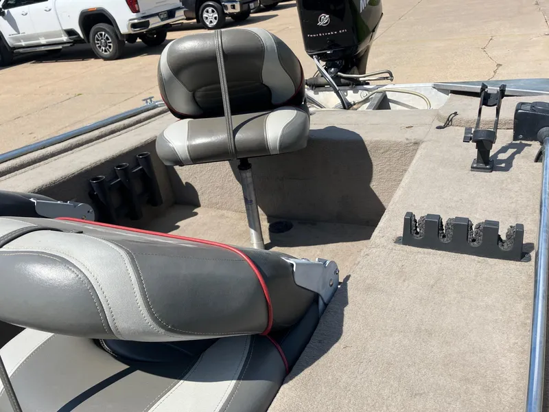 Slide: The Image of 2007 Tracker Pro Crappie 175 boat interior with seating and fishing rod holders. - 15