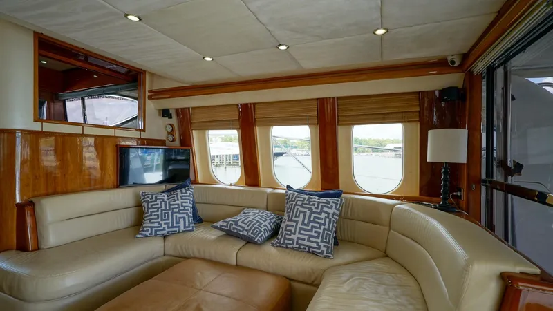 Slide: The Image of Luxurious 2002 Viking Princess 68 yacht interior with plush seating and elegant decor. - 18